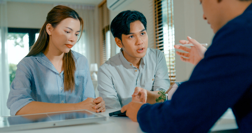 couple speaking with a professional