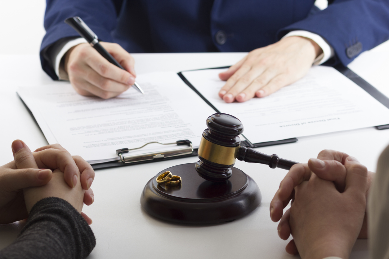 divorcing couple with a lawyer